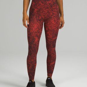 Lululemon wunder train tight size 12, 28’’ denim wash red/black